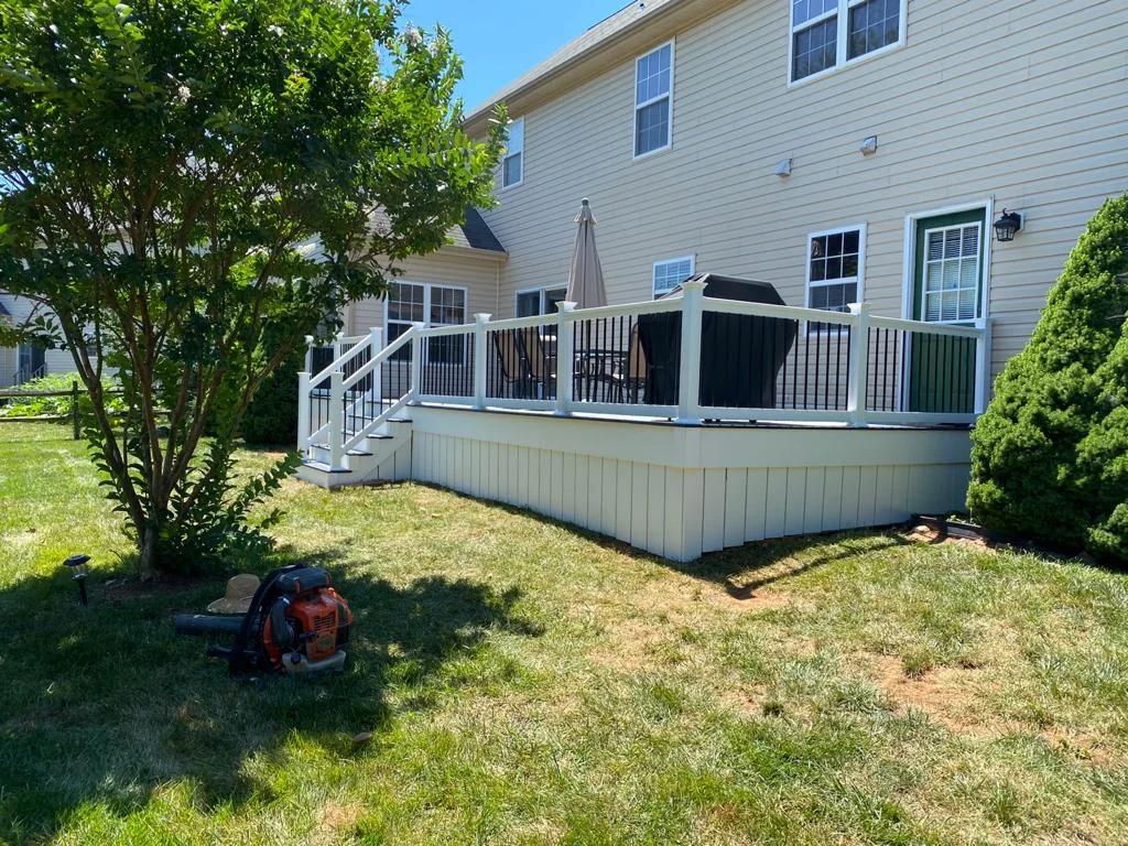 Finished elevated deck beside a home