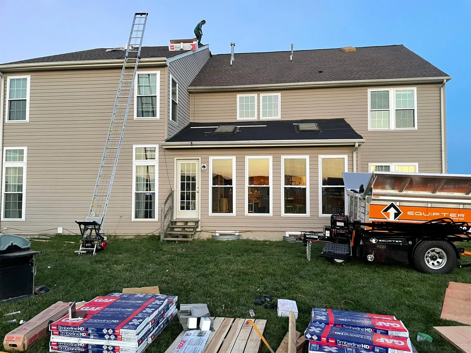 Rear of a house with construction materials on site