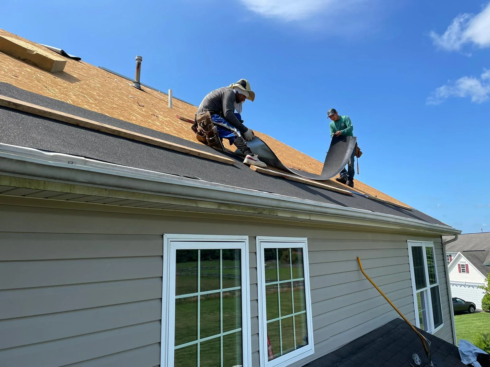 Contractor working on a residential roof