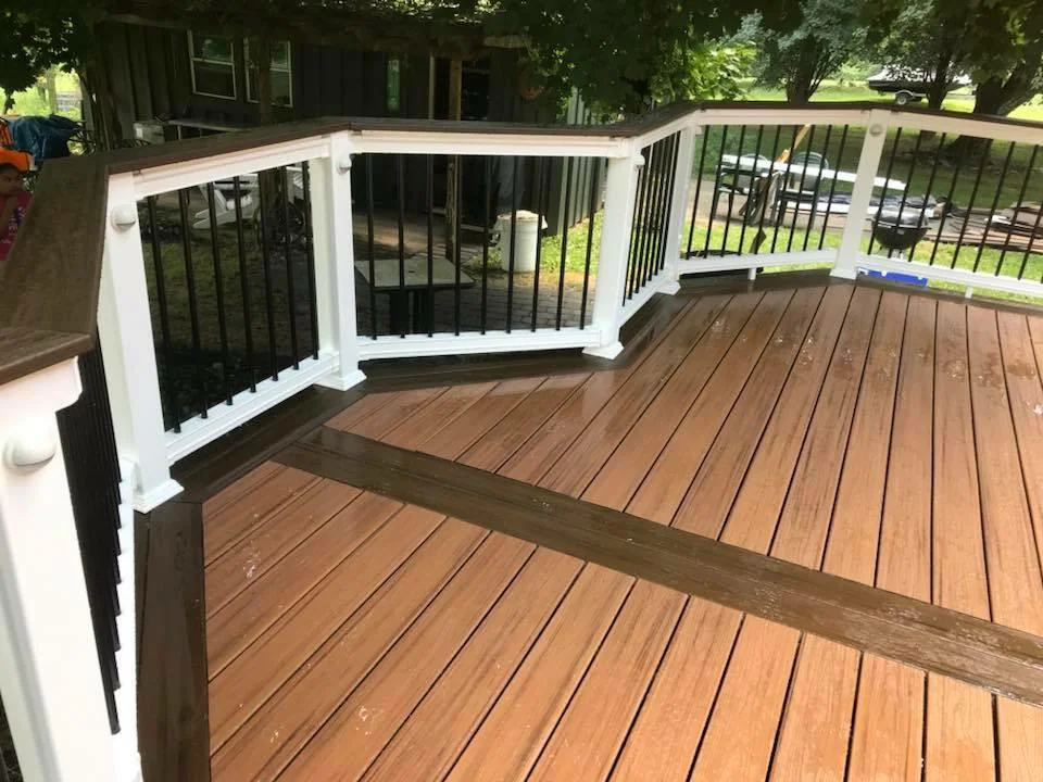 Finished brown deck with white railing