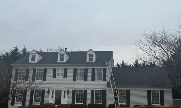 Large home with a finished residential roof