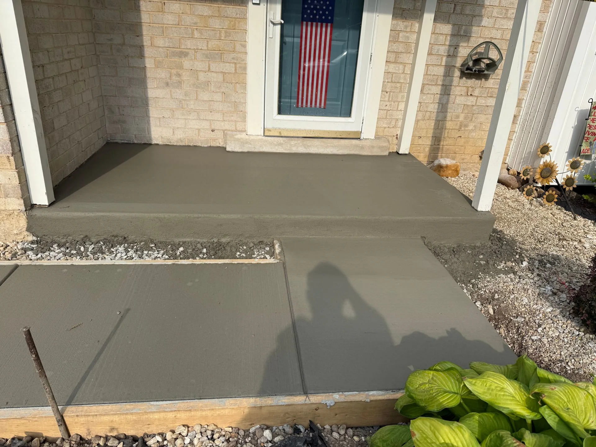 New concrete slab outside a doorway