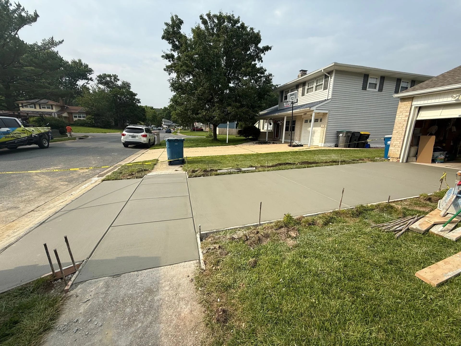 Completed concrete sidewalk between homes