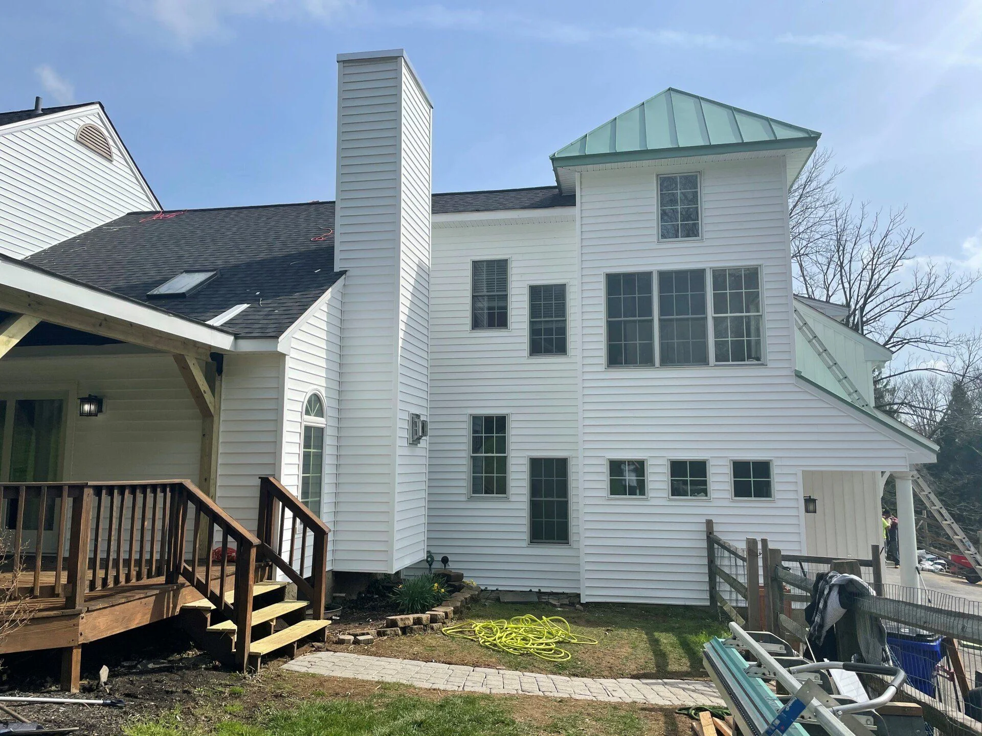 Multi-story home with new siding and exterior work